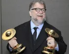 epa10266676 Mexican filmmaker Guillermo Del Toro poses with his awards for Best Film Writing and Best Thriller Film in the press room at the 50th Anniversary Saturn Awards at the Marriott Hotel in Burbank, California, USA, 25 October 2022. The Saturn Awards honors the best in science fiction, fantasy, horror and other genres in film, television, home media releases and theater. EPA/NINA PROMMER/Nina Prommer