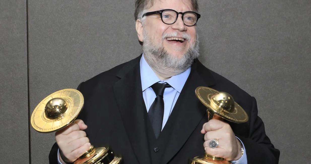 epa10266676 Mexican filmmaker Guillermo Del Toro poses with his awards for Best Film Writing and Best Thriller Film in the press room at the 50th Anniversary Saturn Awards at the Marriott Hotel in Burbank, California, USA, 25 October 2022. The Saturn Awards honors the best in science fiction, fantasy, horror and other genres in film, television, home media releases and theater. EPA/NINA PROMMER/Nina Prommer