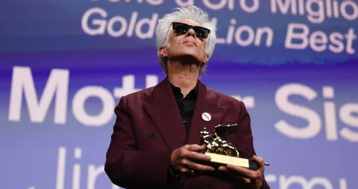 Jim Jarmusch receives the Golden Lion for Best Film for "Father Mother Sister Brother" during the closing ceremony of the 82nd Venice International Film Festival, in Venice, Italy, September 6, 2025. REUTERS/Yara Nardi/Yara Nardi