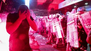 Riot police officers use pepper spray, while clashing with anti-government protestors, during a protest against what the demonstrators say is an increase in police brutality, at the university campus, in Novi Sad, Serbia, September 5, 2025. REUTERS/Zorana Jevtic/Zorana Jevtic
