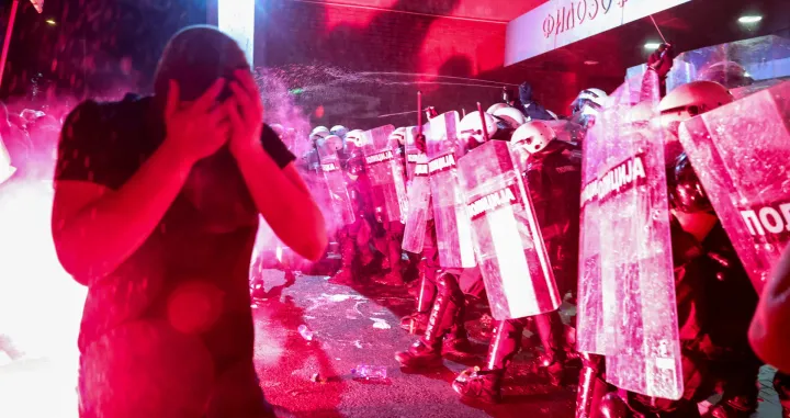 Riot police officers use pepper spray, while clashing with anti-government protestors, during a protest against what the demonstrators say is an increase in police brutality, at the university campus, in Novi Sad, Serbia, September 5, 2025. REUTERS/Zorana Jevtic/Zorana Jevtic