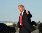 U.S. President Donald Trump gestures as he arrives at LaGuardia Airport in New York, U.S., September 11, 2025. REUTERS/Ken Cedeno/Ken Cedeno