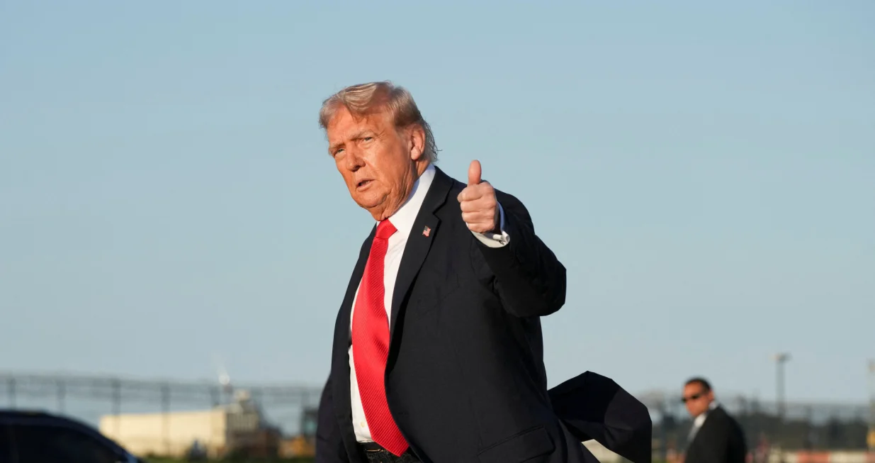 U.S. President Donald Trump gestures as he arrives at LaGuardia Airport in New York, U.S., September 11, 2025. REUTERS/Ken Cedeno/Ken Cedeno
