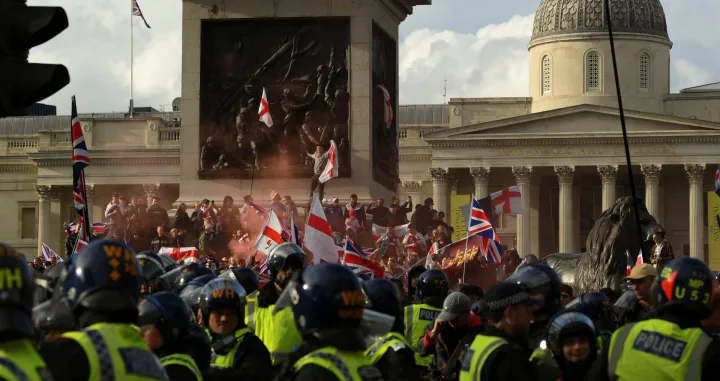 Protesters gather in Trafalgar Square on the day of an anti-immigration rally organised by British anti-immigration activist Stephen Yaxley-Lennon, also known as Tommy Robinson, in London, Britain, September 13, 2025. REUTERS/Jaimi Joy/Jaimi Joy