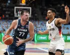 Basketball - FIBA EuroBasket 2025 - Quarter Finals - Germany v Slovenia - Xiaomi Arena, Riga, Latvia - September 10, 2025 Slovenia's Luka Doncic in action with Germany's Maodo Lo REUTERS/Ints Kalnins/Foto: Ints Kalnins