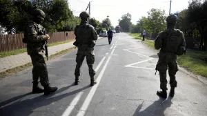 Soldiers patrol the street after a drone or similar object struck a residential building according to local authorities, following violations of Polish airspace during a Russian attack on Ukraine, in Wyryki municipality, Poland September 10, 2025. Agencja Wyborcza.pl/Jakub Orzechowski/via REUTERS ATTENTION EDITORS - THIS IMAGE WAS PROVIDED BY A THIRD PARTY. POLAND OUT. NO COMMERCIAL OR EDITORIAL SALES IN POLAND./Jakub Orzechowski/agencja Wybo