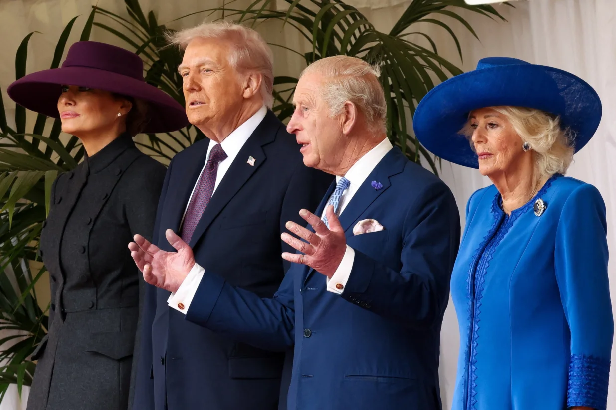 U.S. President Donald Trump, first lady Melania Trump, Britain's King Charles and Queen Camilla attend a welcome ceremony during Trump's state visit, at Windsor Castle, in Windsor, Britain, September 17, 2025. REUTERS/Kevin Lamarque/Kevin Lamarque
