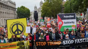 People hold up signs at a 'Trump Not Welcome' protest during the state visit of U.S. President Donald Trump and first lady Melania Trump, in London, Britain, September 17, 2025. REUTERS/Isabel Infantes/Isabel Infantes