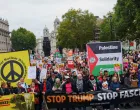 People hold up signs at a 'Trump Not Welcome' protest during the state visit of U.S. President Donald Trump and first lady Melania Trump, in London, Britain, September 17, 2025. REUTERS/Isabel Infantes/Isabel Infantes