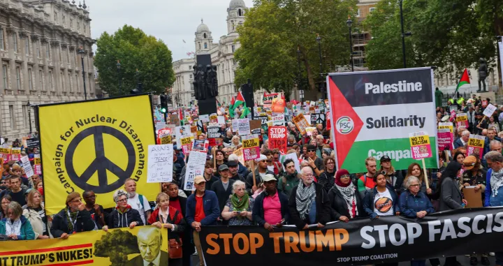 People hold up signs at a 'Trump Not Welcome' protest during the state visit of U.S. President Donald Trump and first lady Melania Trump, in London, Britain, September 17, 2025. REUTERS/Isabel Infantes/Isabel Infantes