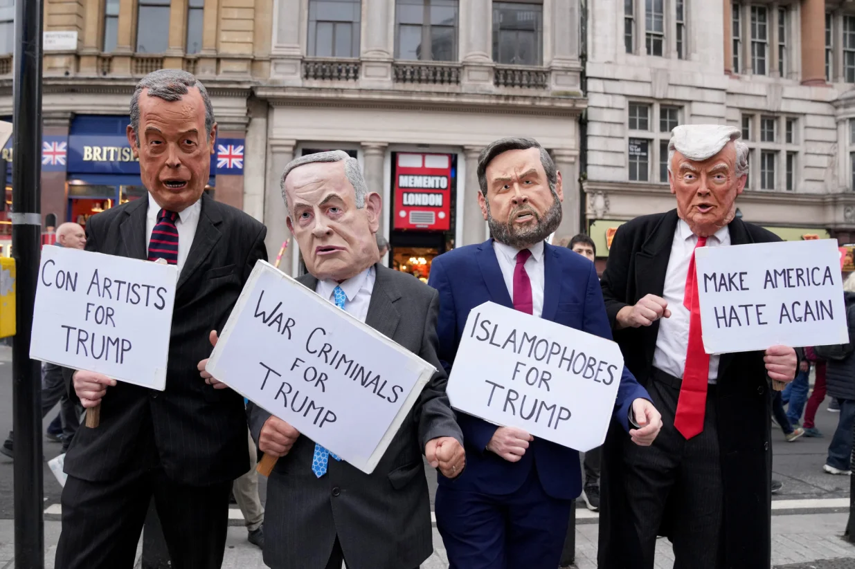People derssed as Britain's Reform UK party leader Nigel Farage, Israeli Prime Minister Benjamin Netanyahu, U.S. Vice President JD Vance and U.S. President Donald Trump take part in a 'Trump Not Welcome' protest and rally during the state visit of U.S. President Donald Trump and first lady Melania Trump, in London, Britain, September 17, 2025. REUTERS/Maja Smiejkowska/Maja Smiejkowska