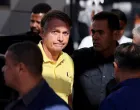 FILE PHOTO: Brazil's former President Jair Bolsonaro arrives at a hospital for medical examinations, authorized by Supreme Court Justice Alexandre de Moraes, leaving the house arrest as he awaits trial after being accused of plotting a coup following his electoral defeat, in Brasilia, Brazil, August 16, 2025. REUTERS/Adriano Machado/File Photo/Adriano Machado