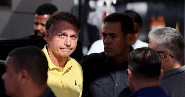 FILE PHOTO: Brazil's former President Jair Bolsonaro arrives at a hospital for medical examinations, authorized by Supreme Court Justice Alexandre de Moraes, leaving the house arrest as he awaits trial after being accused of plotting a coup following his electoral defeat, in Brasilia, Brazil, August 16, 2025. REUTERS/Adriano Machado/File Photo/Adriano Machado