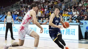 Basketball - FIBA EuroBasket 2025 - Round of 16 - Poland vs Bosnia and Herzegovina - Xiaomi Arena, Riga, Latvia - September 7, 2025 Bosnia and Herzegovina's Amar Gegic in action with Poland's Dominik Olejniczak REUTERS/Ints Kalnins/Foto: Ints Kalnins