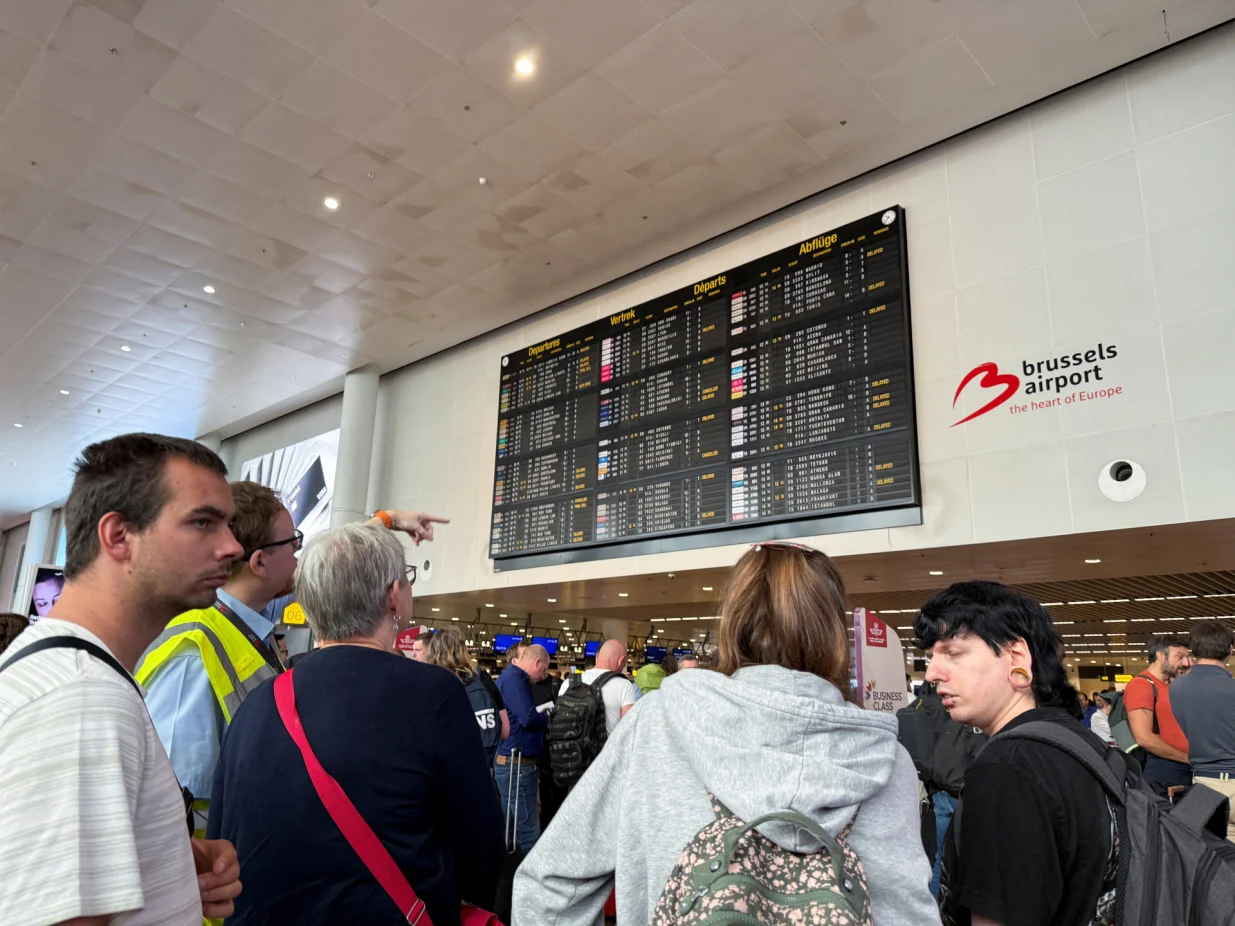Travellers wait at Brussels airport, after a cyberattack at a service provider for check-in and boarding systems disrupted operations at several major European airports, in Zaventem near Brussels, Belgium September 20, 2025. REUTERS/Marta Fiorin/Marta Fiorin