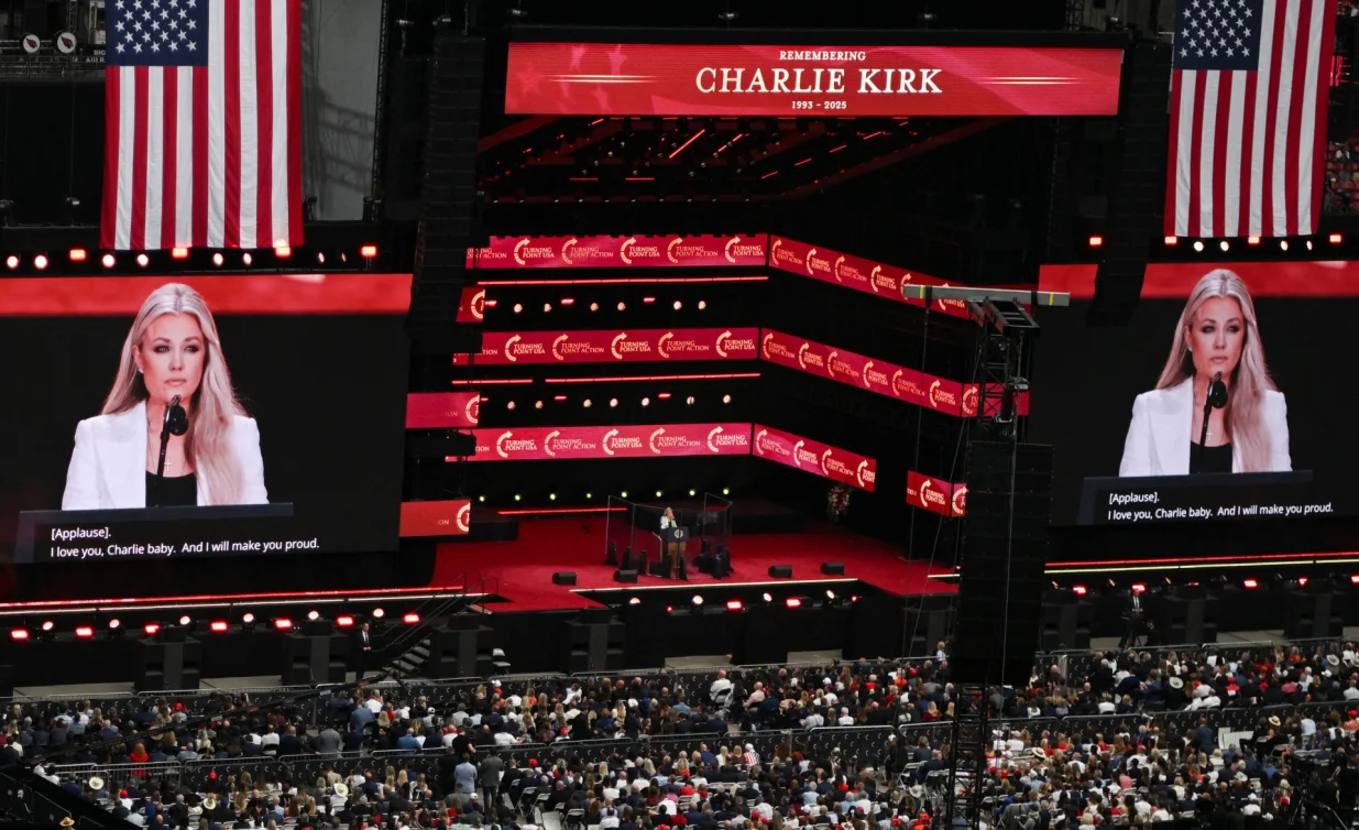 Erika Kirk speaks during a memorial service for her husband, slain conservative commentator Charlie Kirk, at State Farm Stadium in Glendale, Arizona, U.S., September 21, 2025. REUTERS/Callaghan O'Hare/Callaghan O'hare