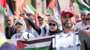 People participate in a demonstration called, "All of Denmark on the streets for a free Palestine", in support of Palestinian in Gaza, amid the ongoing conflict between Israel and Hamas, in the streets of Copenhagen, Denmark August 24, 2025. Ritzau Scanpix/Emil Helms via REUTERS ATTENTION EDITORS - THIS IMAGE WAS PROVIDED BY A THIRD PARTY. DENMARK OUT. NO COMMERCIAL OR EDITORIAL SALES IN DENMARK./Emil Helms