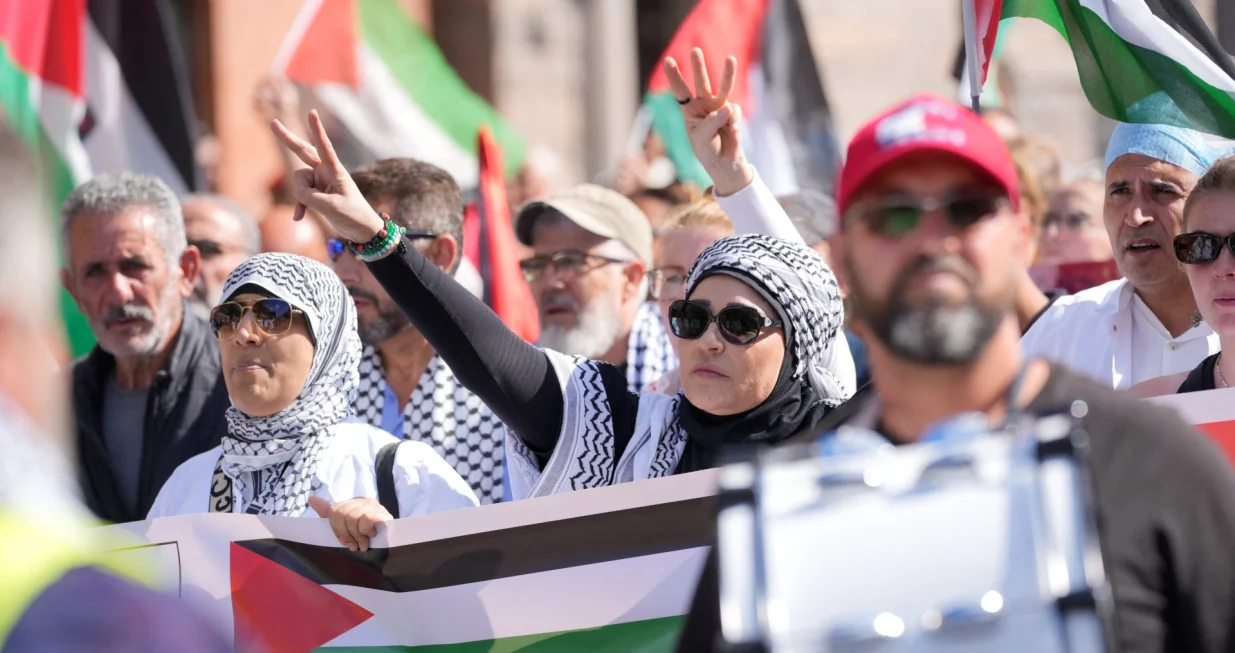 People participate in a demonstration called, "All of Denmark on the streets for a free Palestine", in support of Palestinian in Gaza, amid the ongoing conflict between Israel and Hamas, in the streets of Copenhagen, Denmark August 24, 2025. Ritzau Scanpix/Emil Helms via REUTERS ATTENTION EDITORS - THIS IMAGE WAS PROVIDED BY A THIRD PARTY. DENMARK OUT. NO COMMERCIAL OR EDITORIAL SALES IN DENMARK./Emil Helms