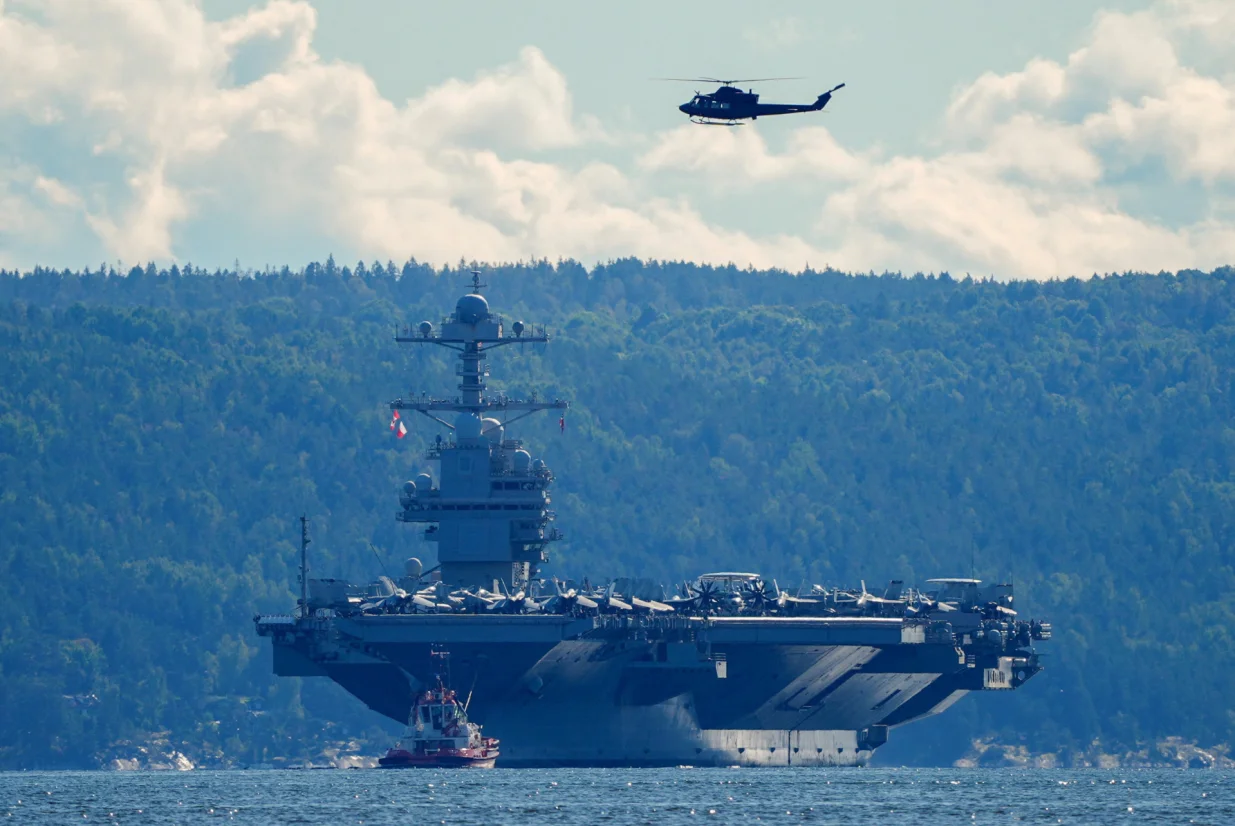 The world's largest warship, U.S. aircraft carrier USS Gerald R. Ford, on its way out of the Oslofjord at Nesodden and Bygdoy, Norway, September 17, 2025. NTB/Lise Aserud via REUTERS ATTENTION EDITORS - THIS IMAGE WAS PROVIDED BY A THIRD PARTY. NORWAY OUT. NO COMMERCIAL OR EDITORIAL SALES IN NORWAY./Lise Aserud
