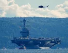 The world's largest warship, U.S. aircraft carrier USS Gerald R. Ford, on its way out of the Oslofjord at Nesodden and Bygdoy, Norway, September 17, 2025. NTB/Lise Aserud via REUTERS ATTENTION EDITORS - THIS IMAGE WAS PROVIDED BY A THIRD PARTY. NORWAY OUT. NO COMMERCIAL OR EDITORIAL SALES IN NORWAY./Lise Aserud