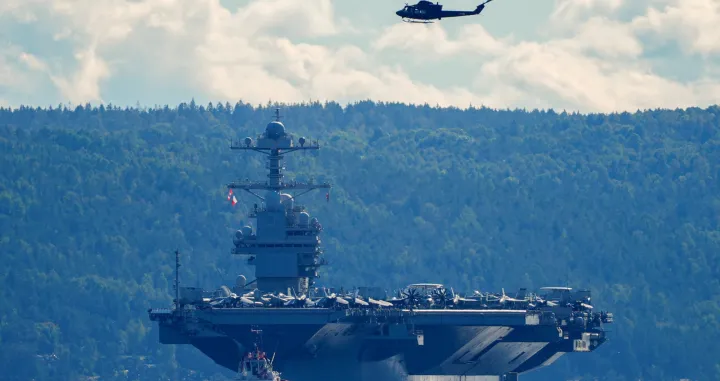 The world's largest warship, U.S. aircraft carrier USS Gerald R. Ford, on its way out of the Oslofjord at Nesodden and Bygdoy, Norway, September 17, 2025. NTB/Lise Aserud via REUTERS ATTENTION EDITORS - THIS IMAGE WAS PROVIDED BY A THIRD PARTY. NORWAY OUT. NO COMMERCIAL OR EDITORIAL SALES IN NORWAY./Lise Aserud