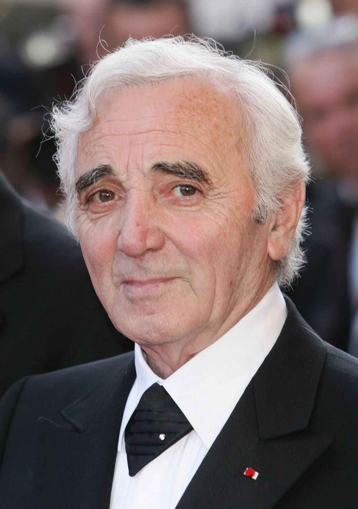 CANNES, FRANCE - MAY 18: Singer Charles Aznavour attends the screening of "Peindre Ou Faire L'Amour" at the Palais during the 58th International Cannes Film Festival May 18, 2005 in Cannes, France. (Photo by Pascal Le Segretain/Getty Images)/Pascal Le Segretain