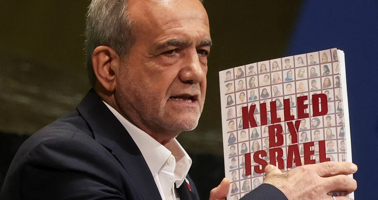 Iran's President Masoud Pezeshkian holds a book as he addresses the 80th United Nations General Assembly (UNGA) at the U.N. headquarters in New York, U.S., September 24, 2025. REUTERS/Shannon Stapleton/Shannon Stapleton