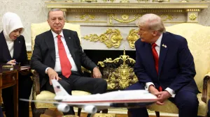 U.S. President Donald Trump listens as Turkey's President Recep Tayyip Erdogan's interpreter speaks during a meeting in the Oval Office at the White House in Washington, D.C., U.S., September 25, 2025. REUTERS/Kevin Lamarque/Kevin Lamarque