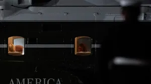 U.S. President Donald Trump and first Lady Melania Trump sit on board Marine One, after attending the 80th United Nations General Assembly, at John F. Kennedy International Airport, in New York, U.S., September 23, 2025. REUTERS/Al Drago/Alexander Drago