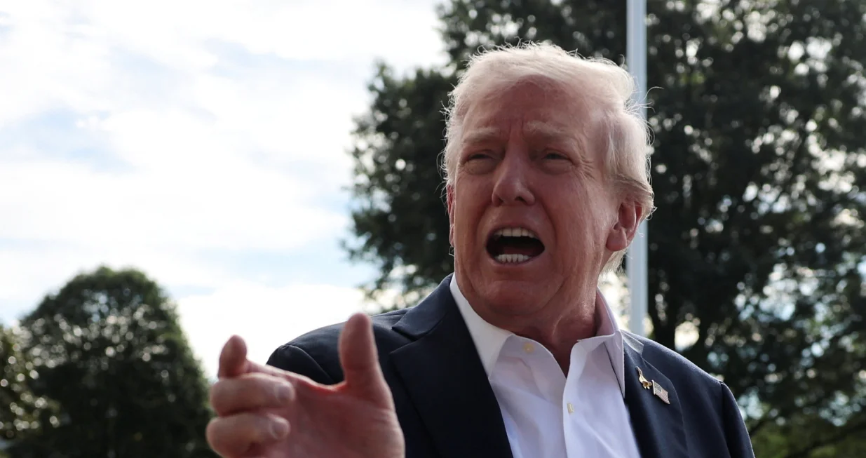 U.S. President Donald Trump speaks to the media before departing for travel to New York to attend the Ryder Cup golf tournament, from the White House in Washington, D.C., U.S., September 26, 2025 REUTERS/Jonathan Ernst/Jonathan Ernst