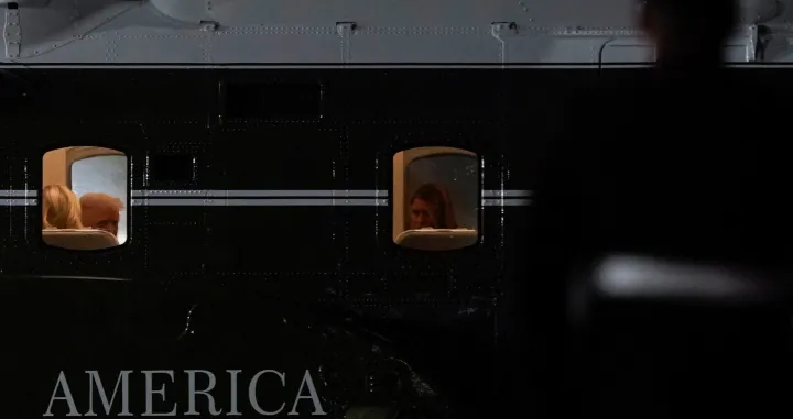 U.S. President Donald Trump and first Lady Melania Trump sit on board Marine One, after attending the 80th United Nations General Assembly, at John F. Kennedy International Airport, in New York, U.S., September 23, 2025. REUTERS/Al Drago/Alexander Drago