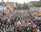 epa10191451 People in traditional clothing participate in the costume parade during the 187th edition of the traditional Oktoberfest beer and amusement festival in the German Bavaria state's capital of Munich, Germany, 18 September 2022. The Oktoberfest 2022 runs from 17 September to 03 October 2022 and several millions of visitors are expected from all over the world. The event resumes after being canceled for two years in a row due to the coronavirus disease (COVID-19) pandemic. EPA/CHRISTIAN BRUNA/Christian Bruna
