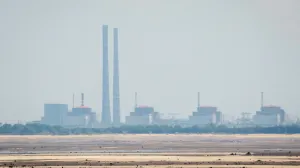 FILE PHOTO: A view shows Zaporizhzhia Nuclear Power Plant from the bank of Kakhovka Reservoir near the town of Nikopol after the Nova Kakhovka dam breached, amid Russia's attack on Ukraine, in Dnipropetrovsk region, Ukraine June 16, 2023. REUTERS/Alina Smutko/File Photo/Alina Smutko