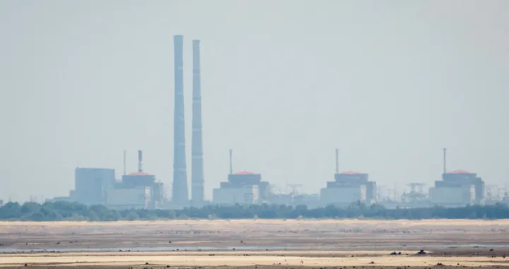 FILE PHOTO: A view shows Zaporizhzhia Nuclear Power Plant from the bank of Kakhovka Reservoir near the town of Nikopol after the Nova Kakhovka dam breached, amid Russia's attack on Ukraine, in Dnipropetrovsk region, Ukraine June 16, 2023. REUTERS/Alina Smutko/File Photo/Alina Smutko