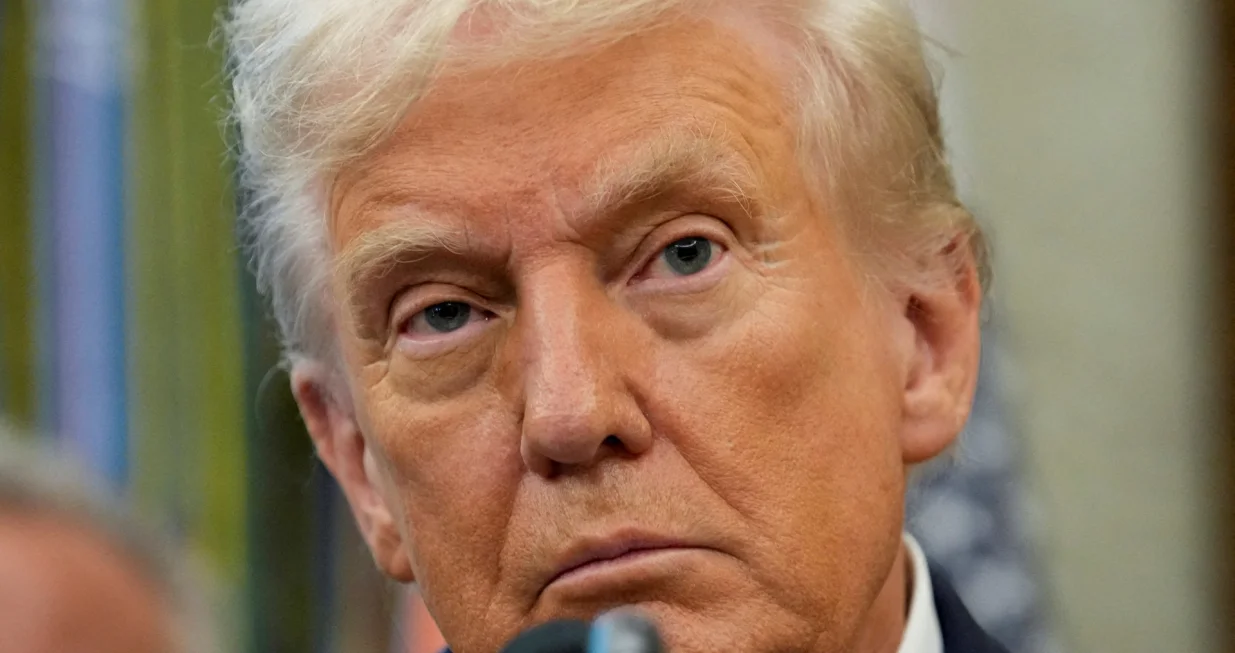 FILE PHOTO: U.S. President Donald Trump looks on as he announces a deal with Pfizer to sell drugs at lower prices, in the Oval office of the White House in Washington, D.C., U.S., September 30, 2025. REUTERS/Ken Cedeno/File Photo/Ken Cedeno