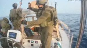 A screengrab from a live stream video shows Israeli navy forces aboard the Gaza-bound vessel Oxygono, part of the Global Sumud Flotilla, which flotilla organisers report has been intercepted, October 2, 2025. Global Sumud Flotilla/Handout via REUTERS THIS IMAGE HAS BEEN SUPPLIED BY A THIRD PARTY. MANDATORY CREDIT. NO RESALES. NO ARCHIVES.  TPX IMAGES OF THE DAY/Global Sumud Flotilla