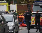 Emergency personnel work at the scene, after a reported attack in which a car was driven at pedestrians and one person was stabbed near a synagogue in north Manchester, Britain, October 2, 2025. REUTERS/Phil Noble/Phil Noble