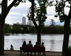 epa08471691 People enjoy a warm evening by the lake of Casa de Campo Park, in Madrid, Spain, 07 June 2020, a day before Madrid changes to phase 2 of the government's plan to gradually ease the lockdown measures implemented in a bid to slow down the spread of the pandemic COVID-19 disease caused by the SARS-CoV-2 coronavirus. Barcelona and parts of the region of Castilla-Leon will also advance to the same phase as the rest of the country will be on phases 3 or 4. EPA/Victor Lerena/Victor Lerena