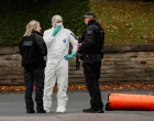 A forensic technician and police officers work at the scene after a man drove a car into pedestrians and stabbed a security guard in an attack at a synagogue where worshippers were marking Yom Kippur, the holiest day on the Jewish calendar, according to the British police, in north Manchester, Britain, October 2, 2025. REUTERS/Phil Noble/Phil Noble