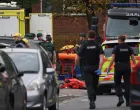 Emergency personnel work at the scene, after a reported attack in which a car was driven at pedestrians and one person was stabbed near a synagogue in north Manchester, Britain, October 2, 2025. REUTERS/Phil Noble/Phil Noble