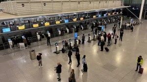People walk inside the airport in Munich, Germany, October 3, 2025, after shutting overnight due to drone sightings that forced the cancellation or diversion of dozens of flights on the eve of a national holiday and heightened concerns about the vulnerability of critical infrastructure in Europe. Operations resumed early on Friday morning.  REUTERS/Ayhan Uyanik/Ayhan Uyanik
