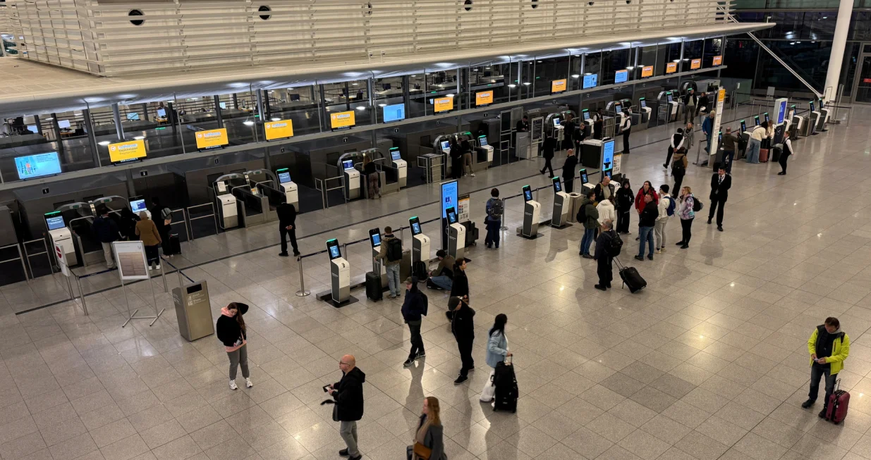 People walk inside the airport in Munich, Germany, October 3, 2025, after shutting overnight due to drone sightings that forced the cancellation or diversion of dozens of flights on the eve of a national holiday and heightened concerns about the vulnerability of critical infrastructure in Europe. Operations resumed early on Friday morning.  REUTERS/Ayhan Uyanik/Ayhan Uyanik