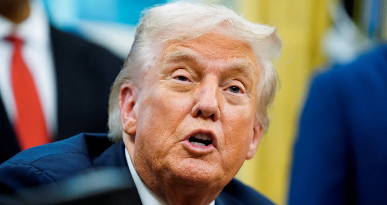 U.S. President Donald Trump speaks in the Oval Office, on the day he signs an executive order on AI and pediatric cancer research, at the White House, Washington, D.C., U.S., September 30, 2025. REUTERS/Nathan Howard/Nathan Howard
