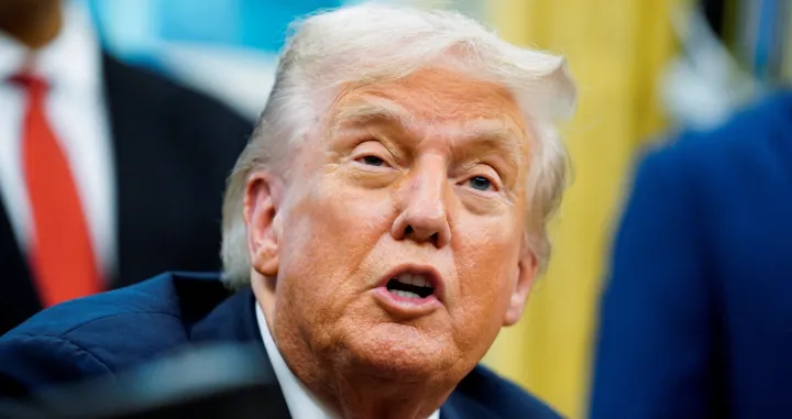 U.S. President Donald Trump speaks in the Oval Office, on the day he signs an executive order on AI and pediatric cancer research, at the White House, Washington, D.C., U.S., September 30, 2025. REUTERS/Nathan Howard/Nathan Howard
