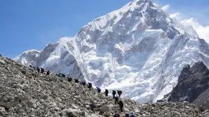 FILE PHOTO: Mountaineers and trekkers head towards the Everest base camp from Lobuche in the Solukhumbu district, also known as the Everest region, Nepal April 12, 2025. REUTERS/Purnima Shrestha/File Photo/Stringer