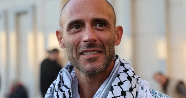 Tommaso Bortolazzi of Italy, one of the activists who were sailing aboard vessels from the Global Sumud Flotilla which were seized by Israeli forces, reacts after arriving at Istanbul Airport on a special flight, in Istanbul, Turkey, October 4, 2025. REUTERS/Umit Bektas/Umit Bektas