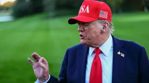 U.S. President Donald Trump speaks to members of the media as he arrives at the White House in Washington, D.C., U.S., October 5, 2025. REUTERS/Aaron Schwartz/Aaron Schwartz
