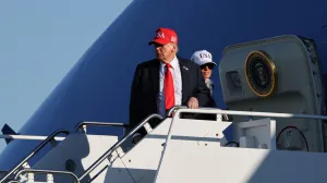 U.S. President Donald Trump and first lady Melania Trump board Air Force One as Trump returns to Washington, in Norfolk, Virginia, U.S. October 5, 2025. REUTERS/Jonathan Ernst/Jonathan Ernst