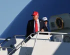 U.S. President Donald Trump and first lady Melania Trump board Air Force One as Trump returns to Washington, in Norfolk, Virginia, U.S. October 5, 2025. REUTERS/Jonathan Ernst/Jonathan Ernst