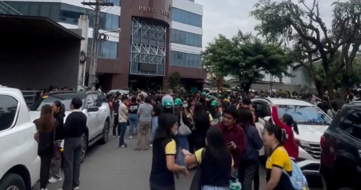 People gather in an open area following an earthquake of magnitude 7.5 that struck offshore in the southern Philippines, in Davao City, Mindanao, Philippines, October 10, 2025, in this screengrab obtained from a social media video. Francis Magbanua/via REUTERS THIS IMAGE HAS BEEN SUPPLIED BY A THIRD PARTY. MANDATORY CREDIT. NO RESALES. NO ARCHIVES. Verification:вЂЁReuters was able to verify the location from building characteristics and business signage that matched file images.вЂЁDate of the video was confirmed by official statements./Francis Magbanua